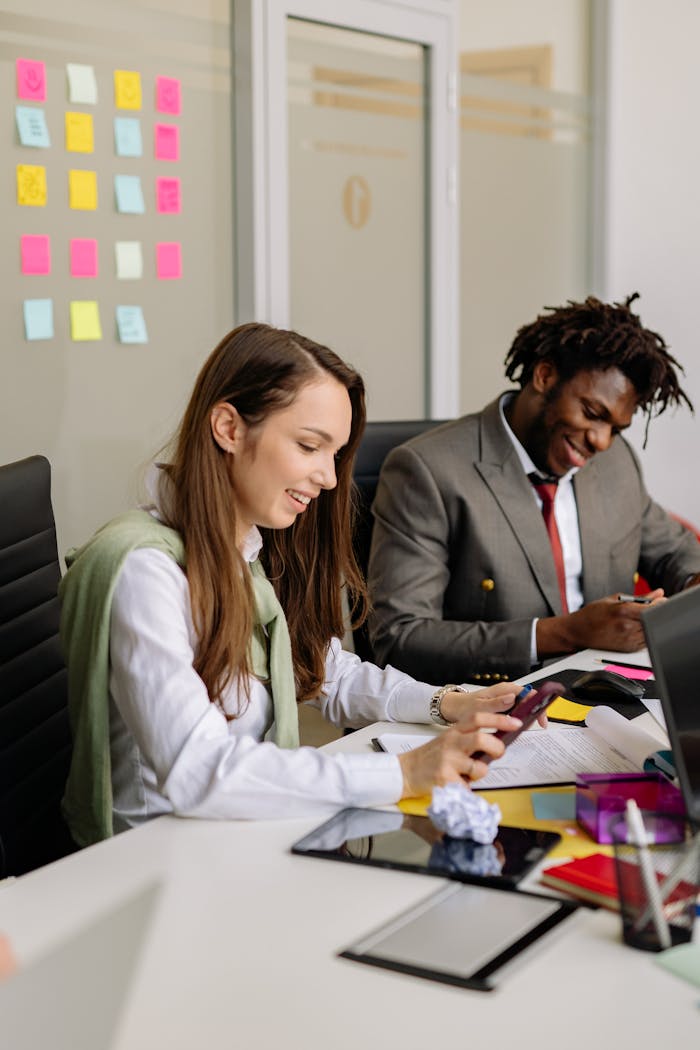 Team of diverse professionals collaborating in a modern office setting, brainstorming ideas.